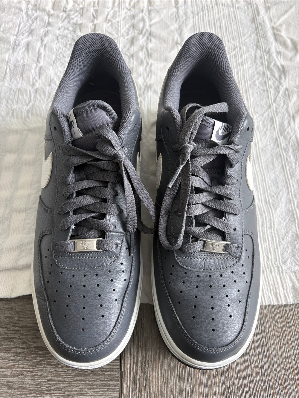 Nike Dark Gray Low-Top Sneakers with White Swoosh